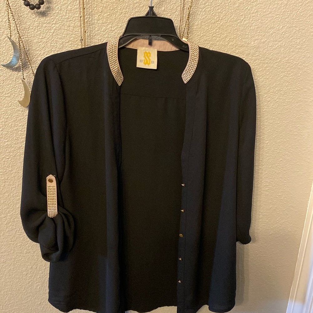 Beautiful, slightly sheer blouse.